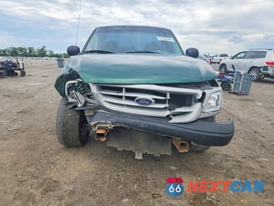 Piąte zdjęcie samochodu w środku: 1999 FORD F150 VIN:1FTZF1727XNB93277 - miniatura