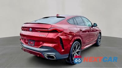 Czwarte zdjęcie samochodu z boku: 2021 BMW X6 M50I VIN:5UXCY8C09M9E51267 - miniatura