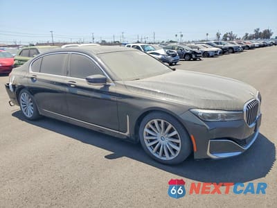 Czwarte zdjęcie samochodu z boku: 2020 BMW 740 I VIN:WBA7T2C09LCD20028 - miniatura