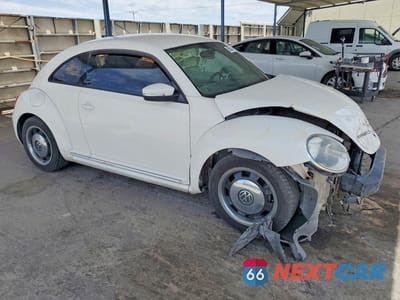 Czwarte zdjęcie samochodu z boku: 2012 VOLKSWAGEN BEETLE VIN:3VWJX7AT1CM638144 - miniatura