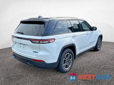 Czwarte zdjęcie samochodu z boku: 2022 JEEP GRAND CHEROKEE TRAILHAWK 4XE VIN:1C4RJYC62N8762046 - miniatura