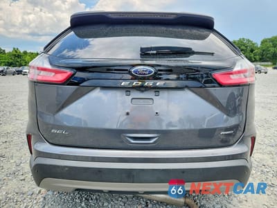 Zdjęcie 6 z 13 samochodu: 2023 FORD EDGE SEL VIN:2FMPK4J92PBA30151 - miniatura