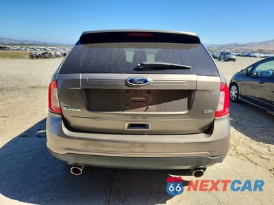 Zdjęcie 6 z 13 samochodu: 2013 FORD EDGE SEL VIN:2FMDK3JC8DBA87054 - miniatura