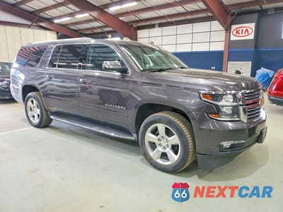 Czwarte zdjęcie samochodu z boku: 2015 CHEVROLET SUBURBAN K1500 LTZ VIN:1GNSKKKC3FR262600 - miniatura