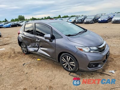 Czwarte zdjęcie samochodu z boku: 2018 HONDA FIT EX VIN:3HGGK5H94JM710981 - miniatura