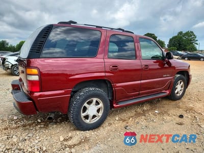 Trzecie zdjęcie samochodu z tyłu: 2003 GMC YUKON DENALI VIN:1GKEK63U73J217033 - miniatura