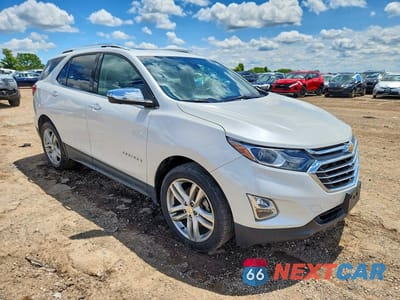 Czwarte zdjęcie samochodu z boku: 2019 CHEVROLET EQUINOX PREMIER VIN:2GNAXYEX3K6296671 - miniatura
