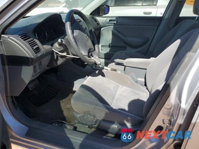 Zdjęcie 7 z 12 samochodu: 2003 HONDA CIVIC LX VIN:2HGES16503H575628 - miniatura