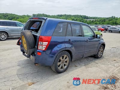 Trzecie zdjęcie samochodu z tyłu: 2012 SUZUKI GRAND VITARA SE VIN:JS3TE0D3XC4100219 - miniatura