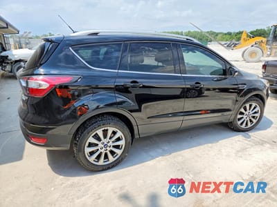 Trzecie zdjęcie samochodu z tyłu: 2017 FORD ESCAPE TITANIUM VIN:1FMCU0JD8HUB52644 - miniatura