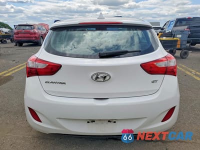 Zdjęcie 6 z 12 samochodu: 2013 HYUNDAI ELANTRA GT BASE VIN:KMHD35LE4DU129625 - miniatura