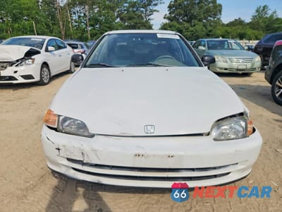 Piąte zdjęcie samochodu w środku: 1995 HONDA CIVIC LX VIN:1HGEG8658SL021183 - miniatura