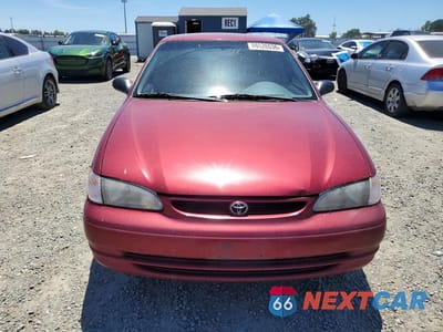 Piąte zdjęcie samochodu w środku: 2000 TOYOTA COROLLA VE VIN:1NXBR12E3YZ350557 - miniatura