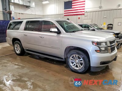 Czwarte zdjęcie samochodu z boku: 2016 CHEVROLET SUBURBAN K1500 LT VIN:1GNSKHKC7GR262555 - miniatura