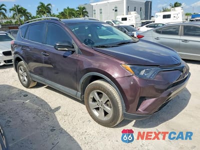 Czwarte zdjęcie samochodu z boku: 2018 TOYOTA RAV4 VIN:2T3ZFREV5JW445670 - miniatura