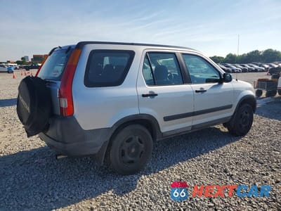 Trzecie zdjęcie samochodu z tyłu: 2003 HONDA CR-V LX VIN:SHSRD68423U101495 - miniatura