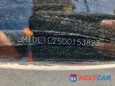 Zdjęcie 12 z 12 samochodu: 2013 MAZDA MAZDA2 VIN:JM1DE1LZ5D0153823 - miniatura