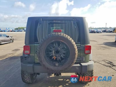 Zdjęcie 6 z 13 samochodu: 2007 JEEP WRANGLER SAHARA VIN:1J4GB59117L143088 - miniatura