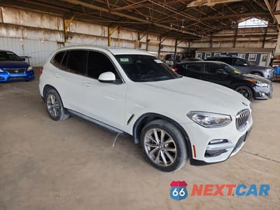 Czwarte zdjęcie samochodu z boku: 2019 BMW X3 SDRIVE30I VIN:5UXTR7C52KLF23655 - miniatura