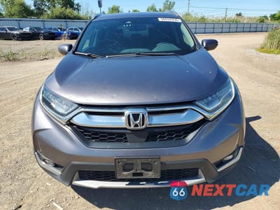 Piąte zdjęcie samochodu w środku: 2018 HONDA CR-V TOURING VIN:7FARW2H90JE099124 - miniatura