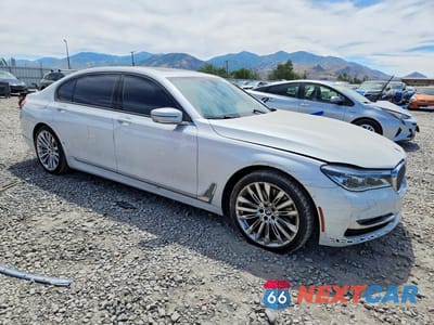 Czwarte zdjęcie samochodu z boku: 2016 BMW 750 XI VIN:WBA7F2C5XGG418922 - miniatura