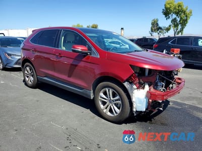 Czwarte zdjęcie samochodu z boku: 2016 FORD EDGE SEL VIN:2FMPK3J82GBB94713 - miniatura