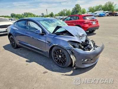 Czwarte zdjęcie samochodu z boku: 2023 TESLA 3 VIN:5YJ3E1EA3PF474249 - miniatura