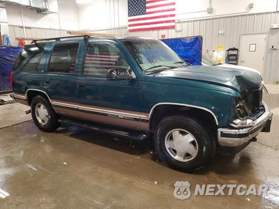 Czwarte zdjęcie samochodu z boku: 1997 GMC YUKON VIN:1GKEK13R4VJ735019 - miniatura