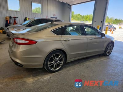Trzecie zdjęcie samochodu z tyłu: 2015 FORD FUSION TITANIUM VIN:3FA6P0K96FR308824 - miniatura
