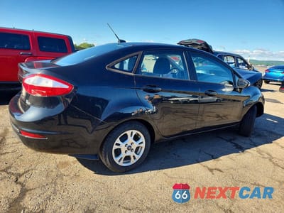 Trzecie zdjęcie samochodu z tyłu: 2015 FORD FIESTA SE VIN:3FADP4BJXFM218792 - miniatura