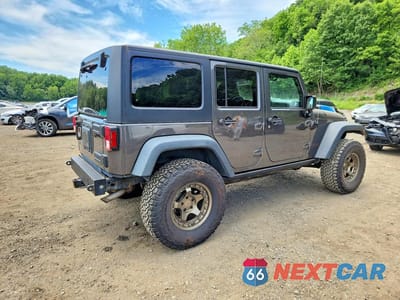 Trzecie zdjęcie samochodu z tyłu: 2014 JEEP WRANGLER UNLIMITED RUBICON VIN:1C4BJWFG1EL214403 - miniatura
