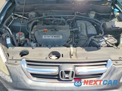 Zdjęcie 12 z 13 samochodu: 2002 HONDA CR-V LX VIN:JHLRD68492C014280 - miniatura