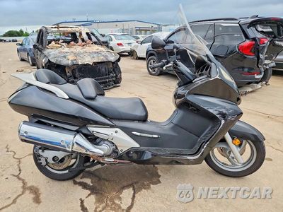 2004 HONDA FSC600 D JH2PF01184K201103 - główne zdjęcie licytacji z USA - miniatura