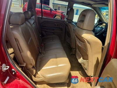 Zdjęcie 11 z 13 samochodu: 2005 HONDA PILOT EXL VIN:2HKYF18595H535992 - miniatura