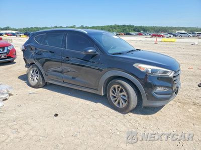 Czwarte zdjęcie samochodu z boku: 2016 HYUNDAI TUCSON SE VIN:KM8J33A47GU211452 - miniatura