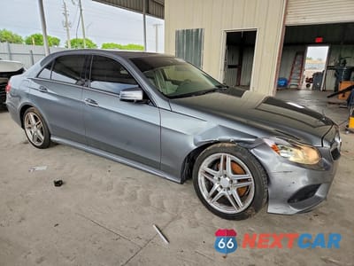 Czwarte zdjęcie samochodu z boku: 2014 MERCEDES-BENZ E 350 VIN:WDDHF5KB7EA872020 - miniatura