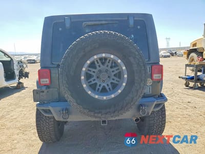 Zdjęcie 6 z 12 samochodu: 2012 JEEP WRANGLER UNLIMITED RUBICON VIN:1C4BJWFGXCL178580 - miniatura