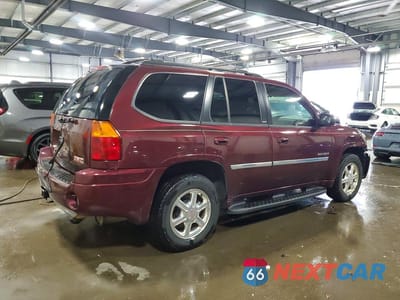 Trzecie zdjęcie samochodu z tyłu: 2006 GMC ENVOY VIN:1GKDS13S162261394 - miniatura