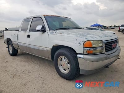 Czwarte zdjęcie samochodu z boku: 2002 GMC NEW SIERRA C1500 VIN:2GTEC19TX21163018 - miniatura