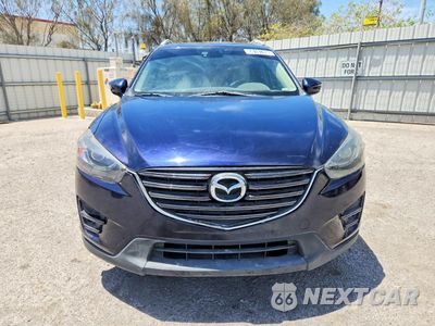 Piąte zdjęcie samochodu w środku: 2016 MAZDA CX-5 GT VIN:JM3KE2DY1G0837251 - miniatura