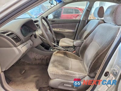 Zdjęcie 7 z 12 samochodu: 2002 TOYOTA CAMRY LE VIN:JTDBE32K820045555 - miniatura
