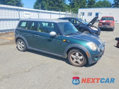 Czwarte zdjęcie samochodu z boku: 2009 MINI COOPER CLUBMAN VIN:WMWML33509TP98722 - miniatura