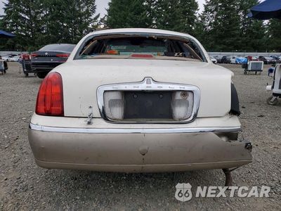 Zdjęcie 6 z 13 samochodu: 1999 LINCOLN TOWN CAR EXECUTIVE VIN:1LNHM81W8XY685378 - miniatura
