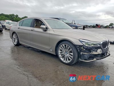 Czwarte zdjęcie samochodu z boku: 2017 BMW 750 XI VIN:WBA7F2C52HG421878 - miniatura
