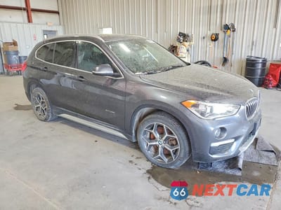Czwarte zdjęcie samochodu z boku: 2017 BMW X1 XDRIVE28I VIN:WBXHT3C36H5F68386 - miniatura