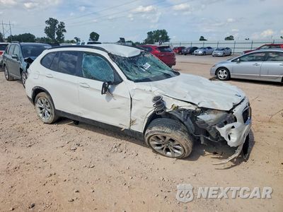 Czwarte zdjęcie samochodu z boku: 2014 BMW X1 XDRIVE28I VIN:WBAVL1C53EVY21823 - miniatura