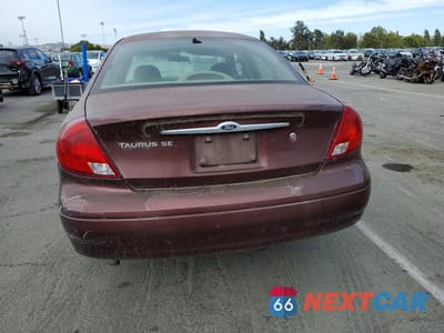 Zdjęcie 6 z 12 samochodu: 2000 FORD TAURUS SES VIN:1FAFP5525YG146528 - miniatura