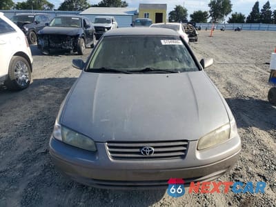 Piąte zdjęcie samochodu w środku: 1999 TOYOTA CAMRY LE VIN:4T1BG22K5XU435965 - miniatura
