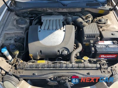 Zdjęcie 11 z 12 samochodu: 2004 KIA OPTIMA LX V6 VIN:KNAGD128145320414 - miniatura