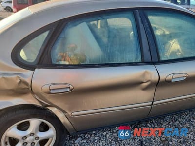 Zdjęcie 10 z 12 samochodu: 2004 FORD TAURUS SES VIN:1FAFP55S64A105905 - miniatura